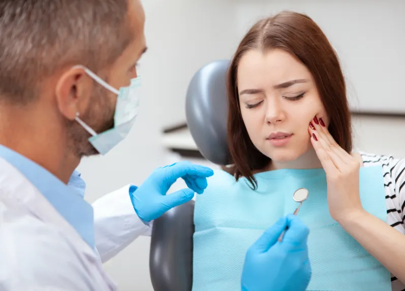 Patient handling a dental emergency during the holidays