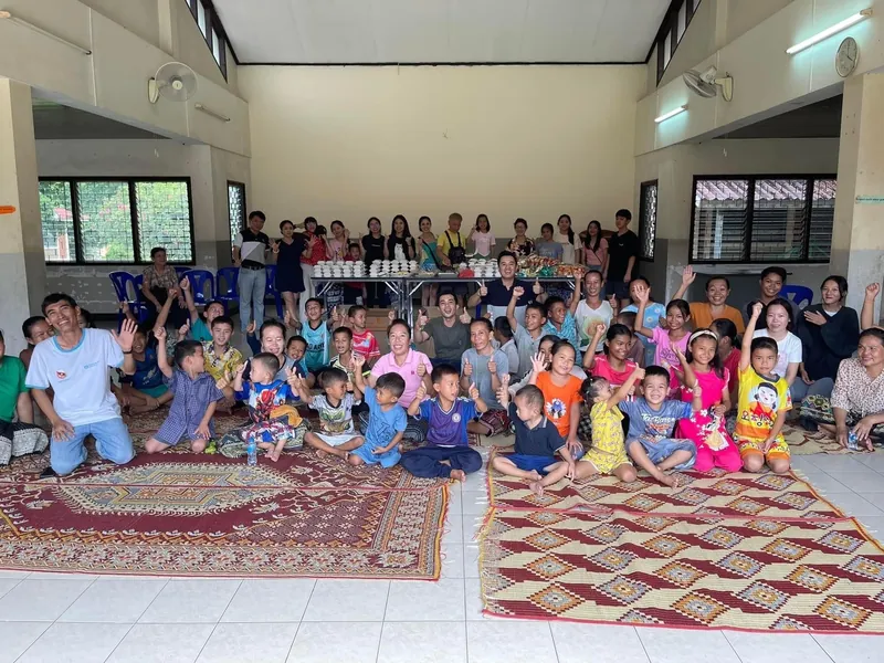 Children at an orphanage in Savannakhet, Laos, during a donation visit by Dr. Hoang's family