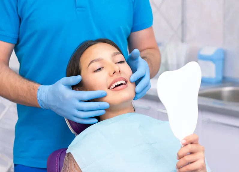 Patient receiving a routine dental checkup