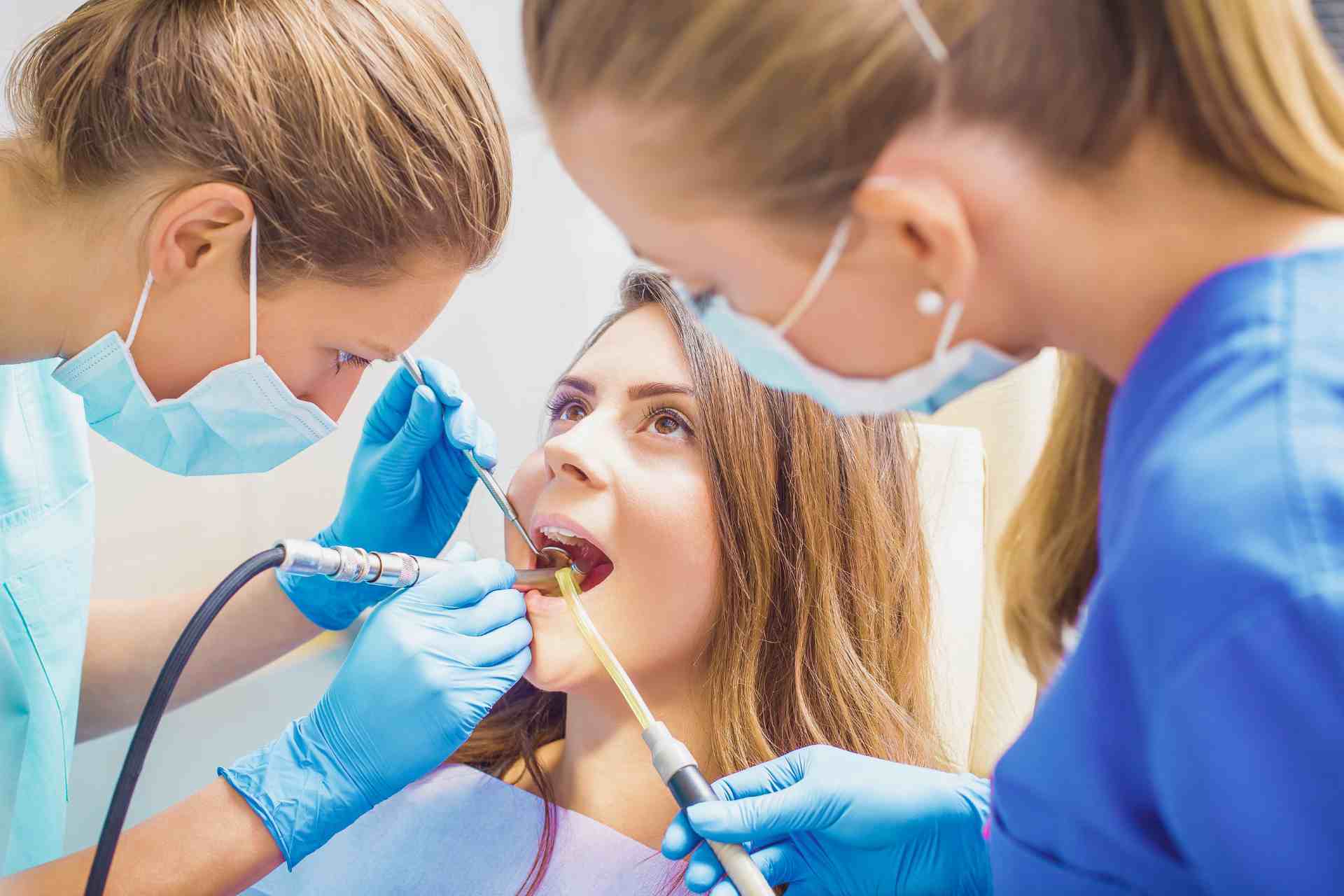 Woman having a dental filling.