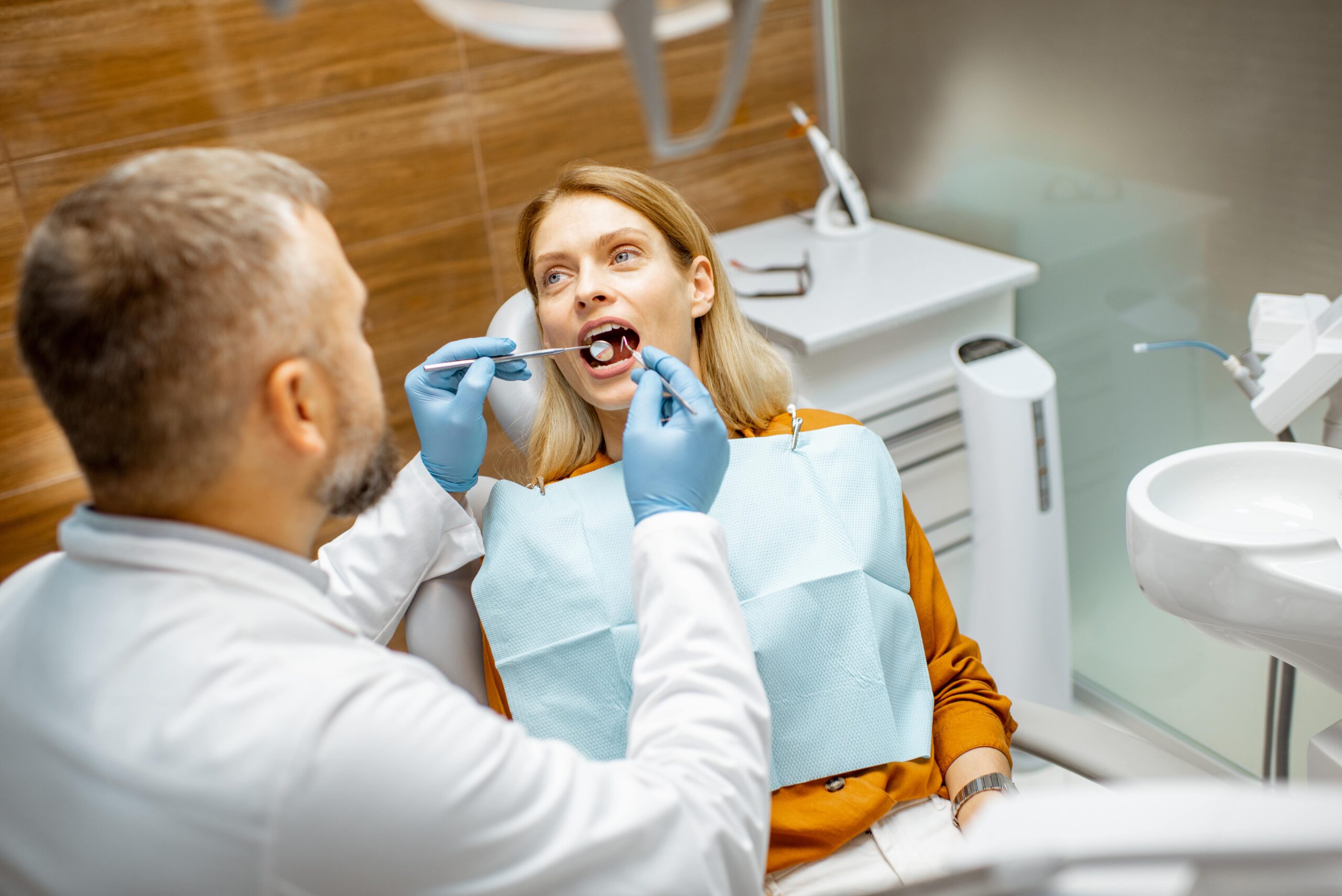 Woman during a teeth inspection at the dental office