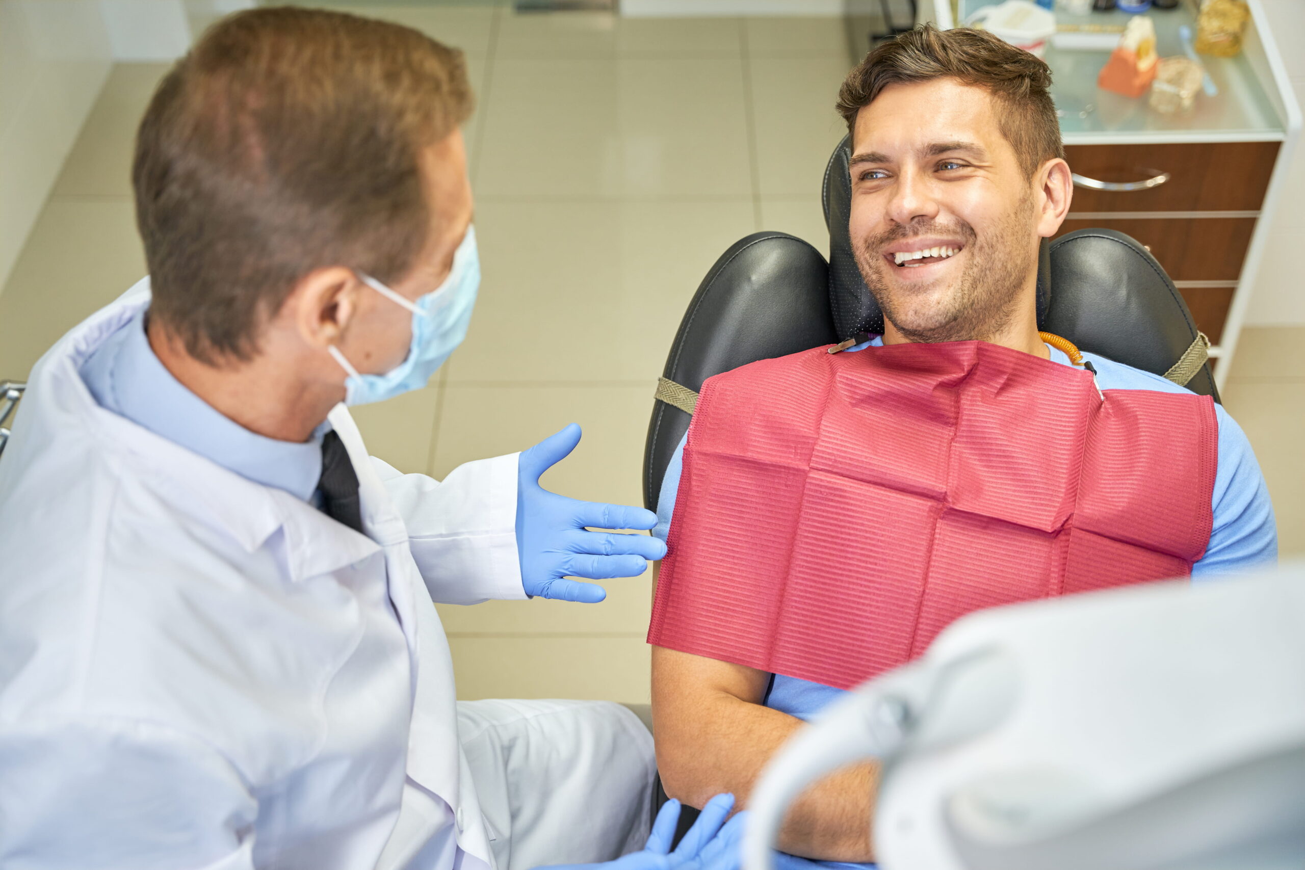 Gentleman smiling at a dentist appointment